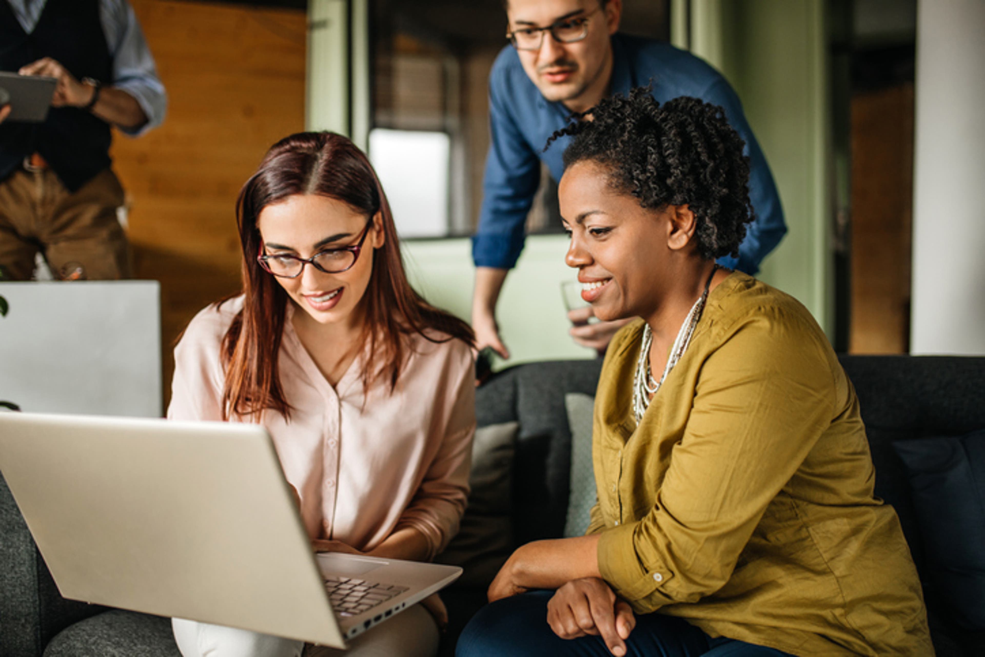 young woman works on tablet