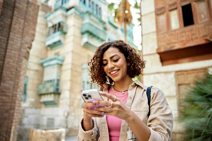 happy software user on a mobile device